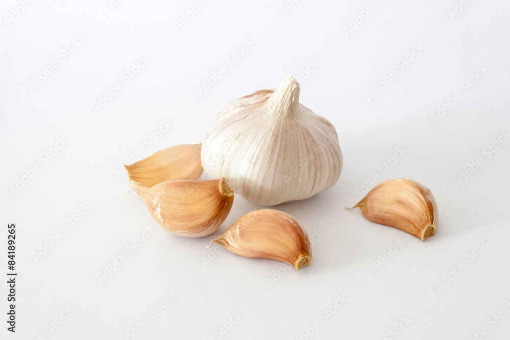 Bulbs of garlics on white background. Bulbs of garlics on white background.