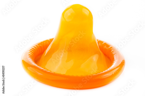 orange condom on white background