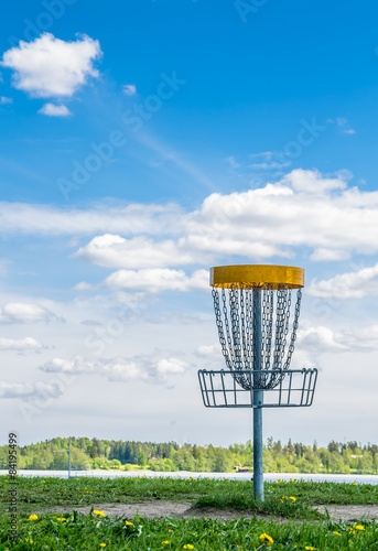Frisbee golf basket on the grass