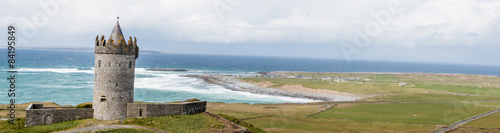 Canvas Print Doonagore Castle and the Aran Islands near Cliffs of Moher Ireland