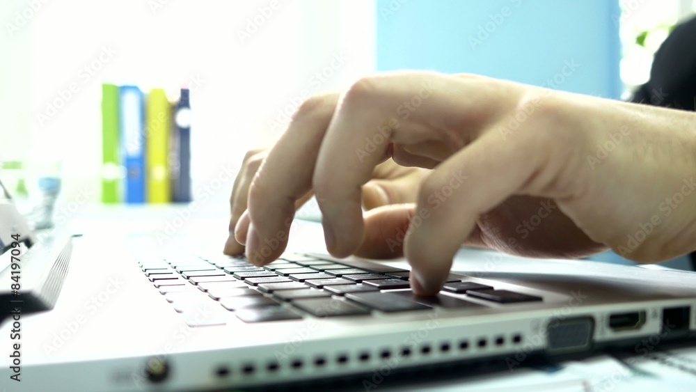 Women's hands typing on computer keyboard Women's hands typing on computer keyboard