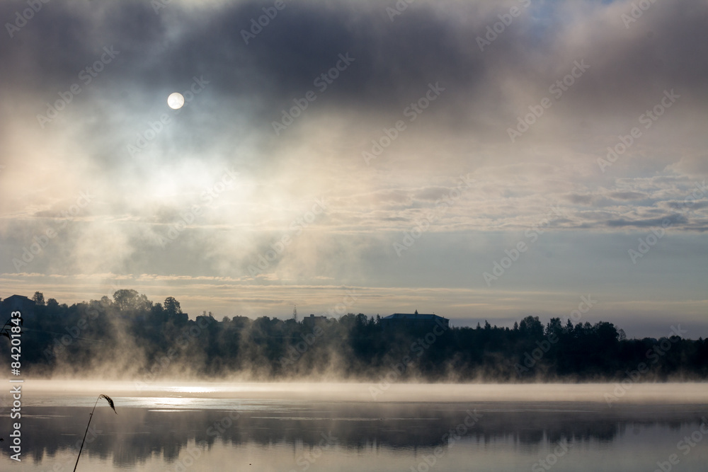 Misty morning at a lake
