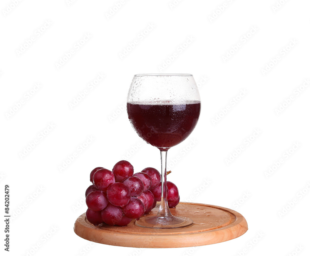 wine glass with red wine, bottle of wine and grapes isolated over white background