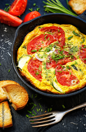 Frittata with tomatoes and fresh chive