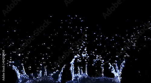 brilliant drops transparent water on black background