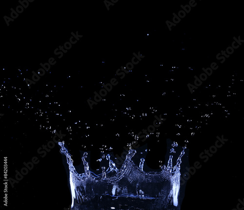 brilliant drops transparent water on black background