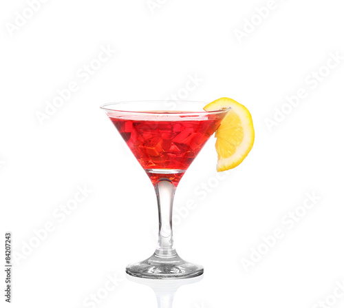 Cocktail with splash and lime slice isolated on white