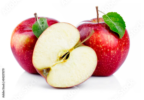 Red apples with leaf and half section isolated on a white