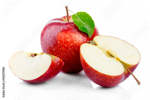 Red apples with leaf and half section isolated on a white