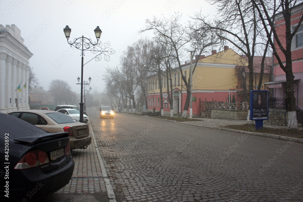 Obraz premium Kamianets-Podilskyi in the fog, Ukraine