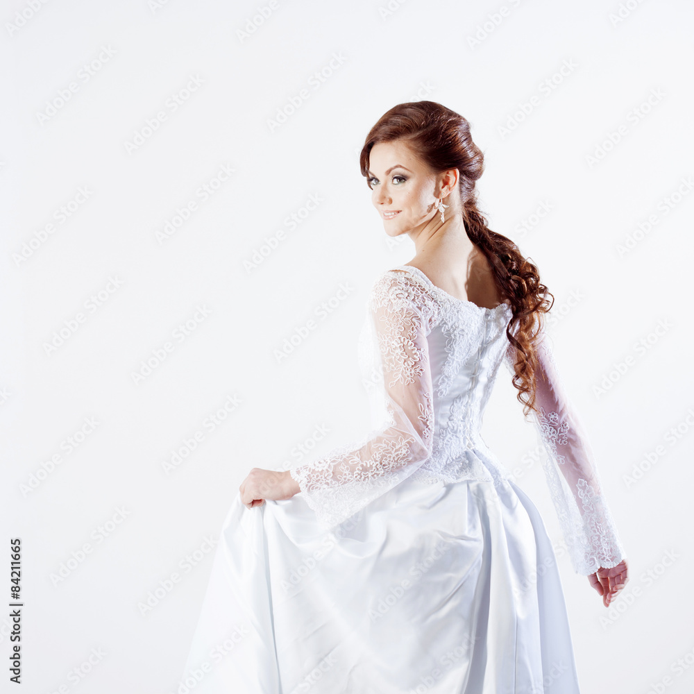 Portrait of happy bride in wedding dress, white background Portrait of happy bride in wedding dress, white background