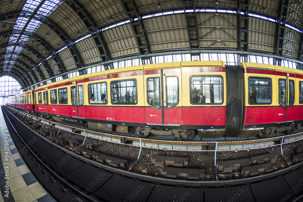 Obraz premium Alexanderplatz subway station in Berlin with train