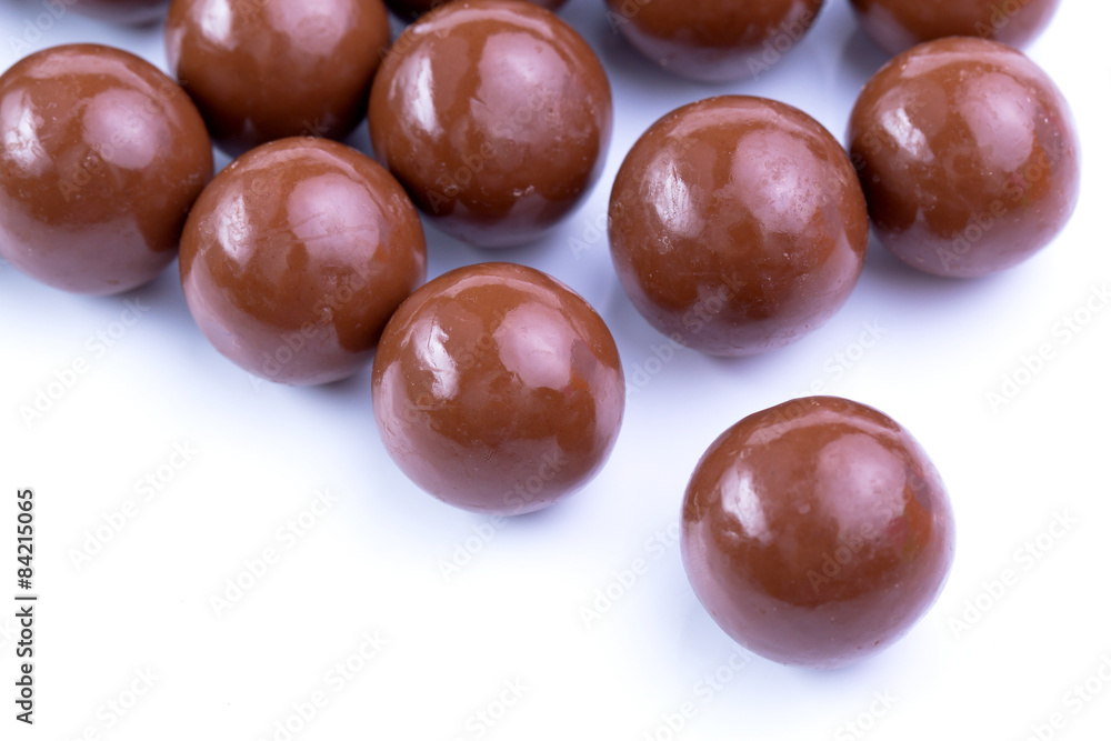 Chocolate candies on a white background. Chocolate candies on a white background.