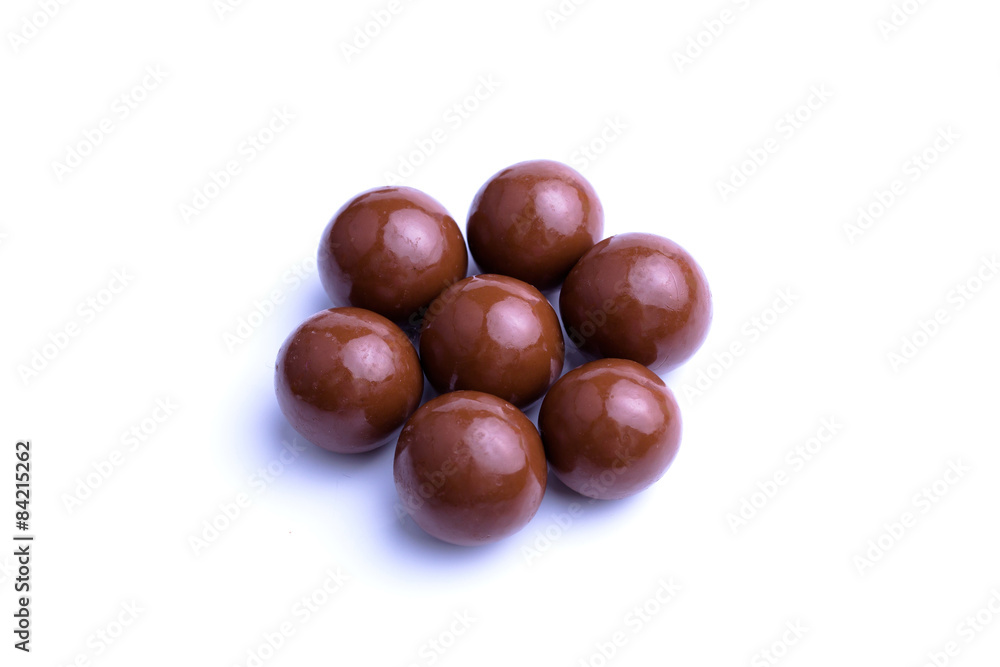 Chocolate candies on a white background. Chocolate candies on a white background.