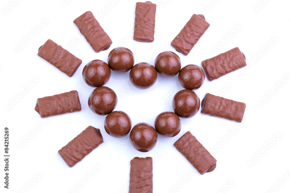Chocolate candies on a white background. Chocolate candies on a white background.