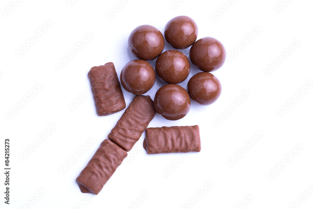 Chocolate candies on a white background. Chocolate candies on a white background.