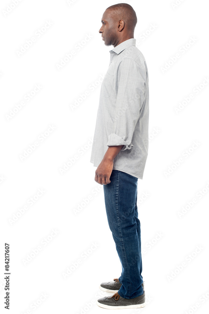 Side view of a happy young man with arms crossed, Stock Photo, Picture And  Low Budget Royalty Free Image. Pic. ESY-000739598 | agefotostock