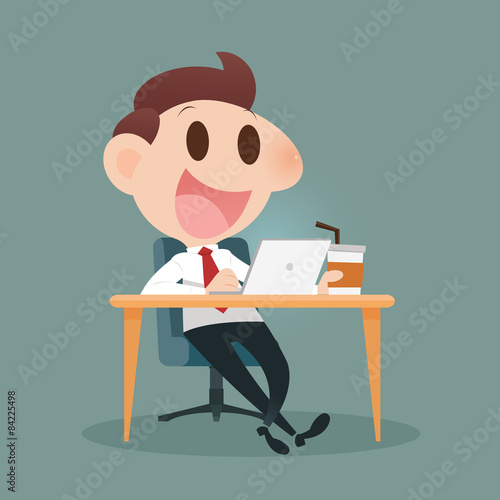 Businessman working on laptop and drinking coffee