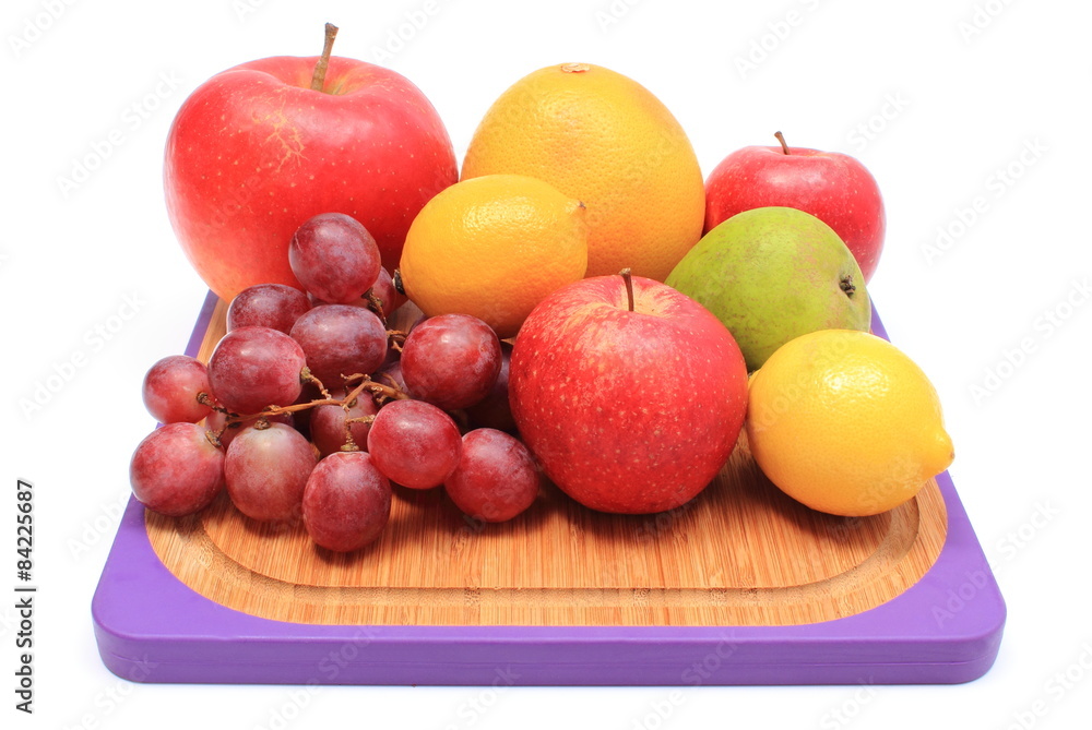 Fresh natural fruits on cutting board