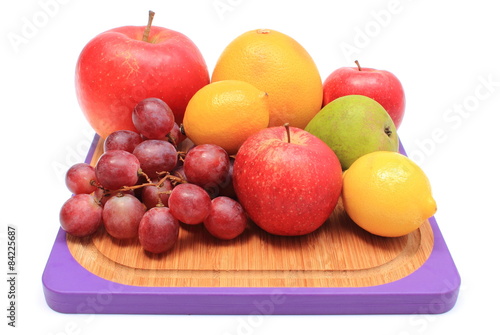 Fresh natural fruits on cutting board