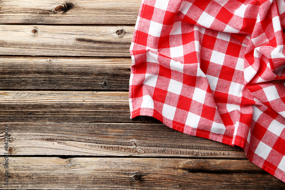 Napkin on brown wooden background Napkin on brown wooden background