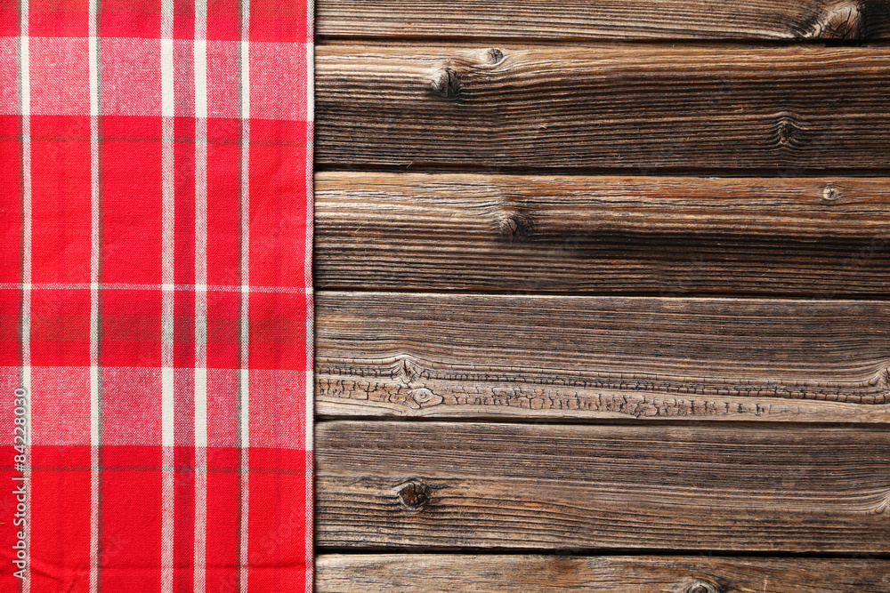 Napkin on brown wooden background Napkin on brown wooden background