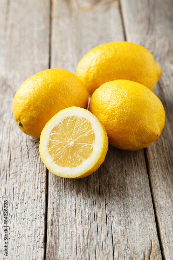 Lemons on grey wooden background Lemons on grey wooden background