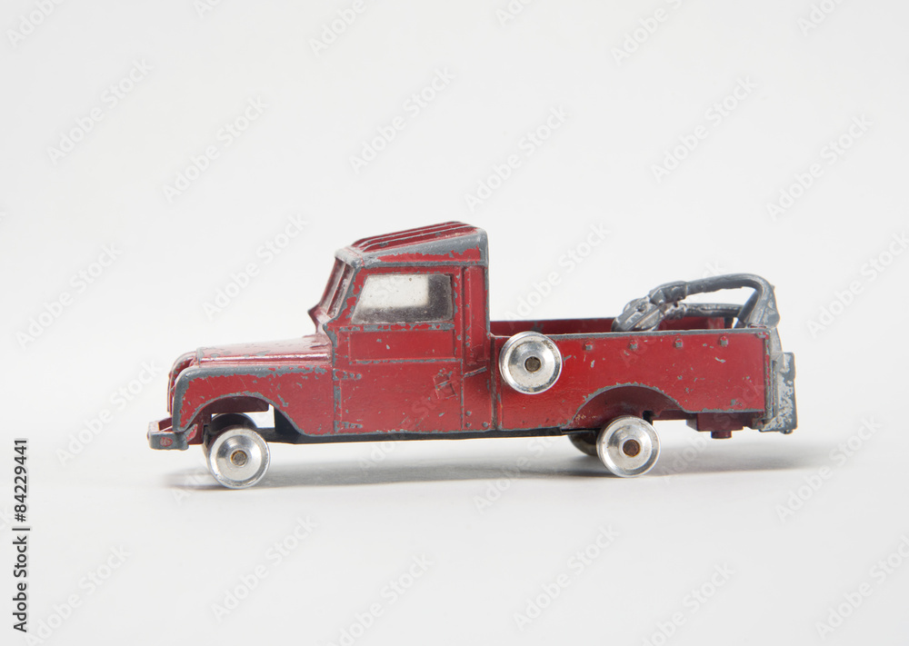 Very battered old toy Series II Land Rover tow truck