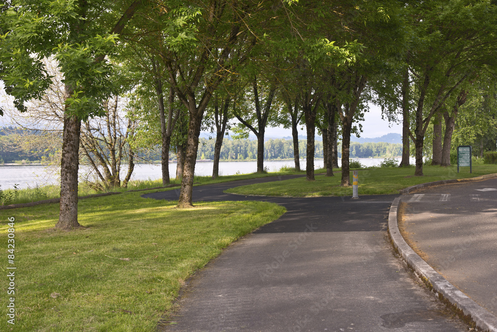 Winding pedestrian path in a park. Winding pedestrian path in a park.