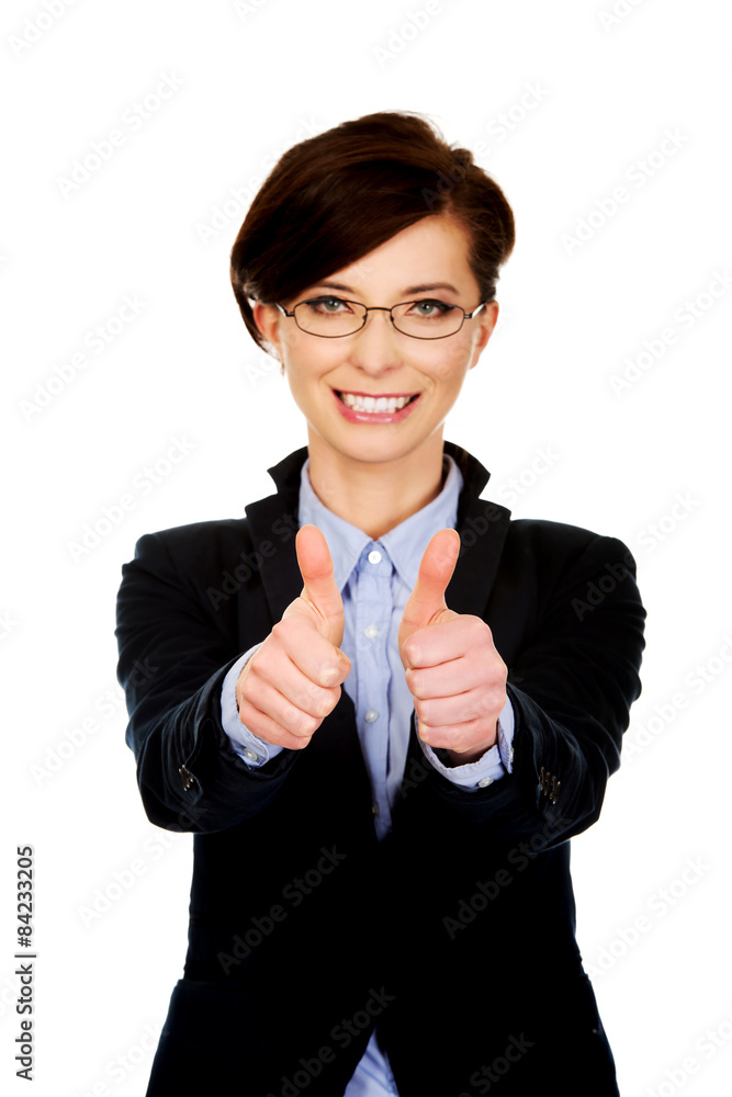 Smiling businesswoman with thumbs up. Smiling businesswoman with thumbs up.