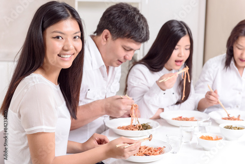 Asian family having lunch together
