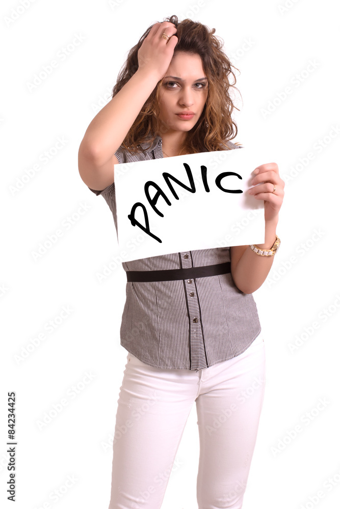 uncomfortable woman holding paper with Panic text uncomfortable woman holding paper with Panic text