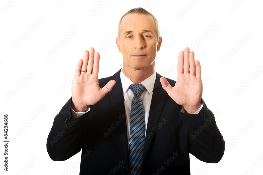 Businessman pressing abstract screen Businessman pressing abstract screen