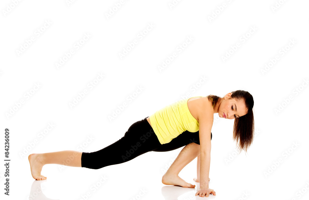 Fitness woman doing stretching exercise. Fitness woman doing stretching exercise.
