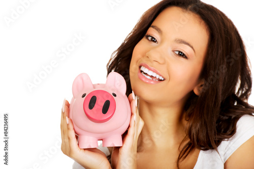 African woman with piggybank.