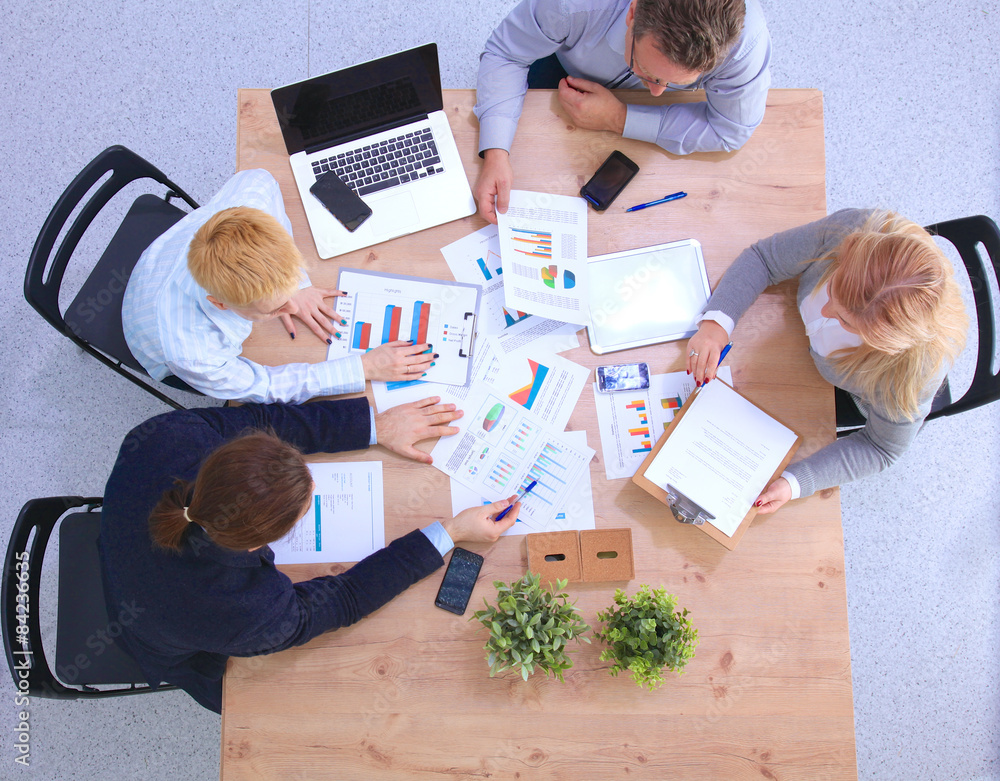 Group of business people working together in office Group of business people working together in office