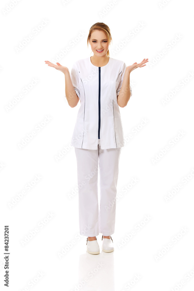 Young female doctor holding an abstract space. Young female doctor holding an abstract space.