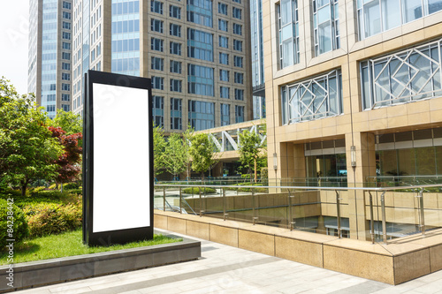 Blank billboard in front of the modern building