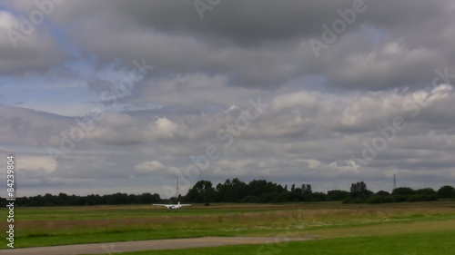 Small aircraft landed in the countryside field