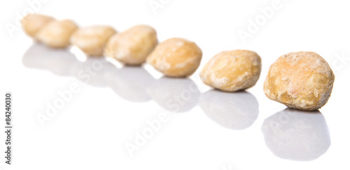 Candlenuts over white background