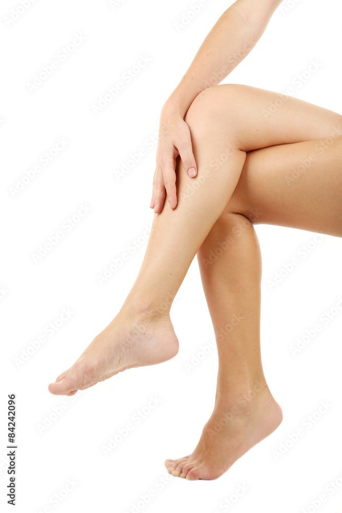 Beautiful woman legs on white background Beautiful woman legs on white background