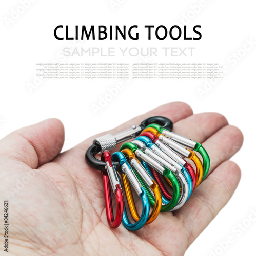 colorful carabiner climbing in hand isolated on white