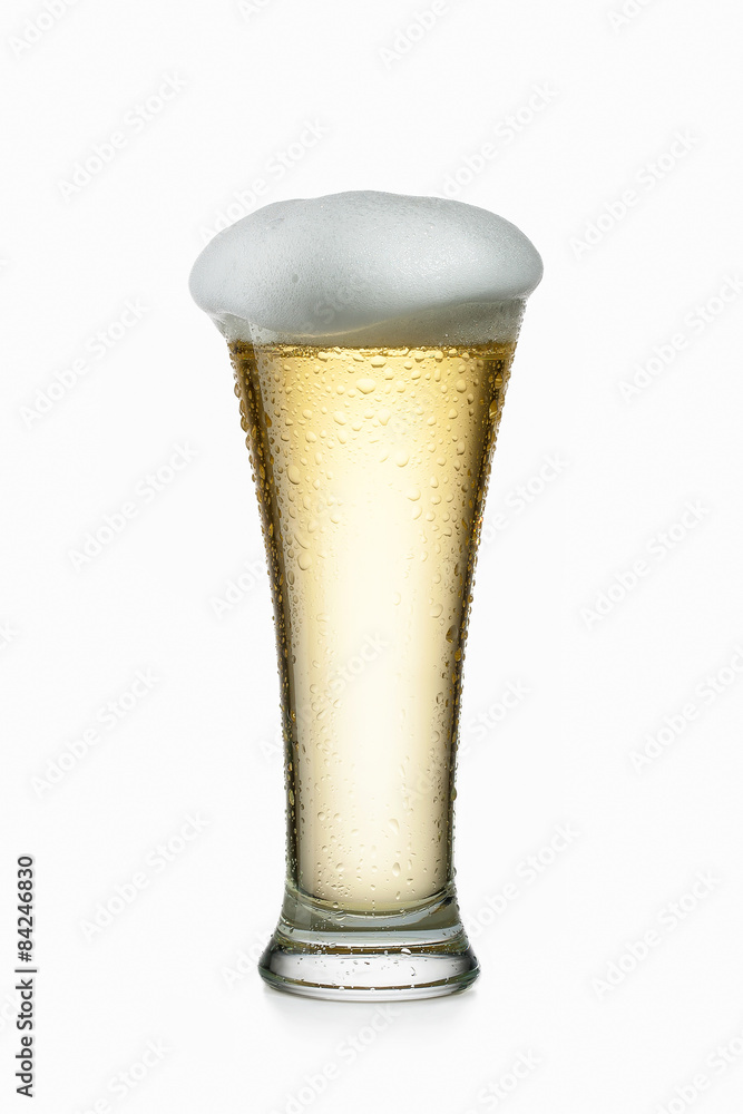 Light beer into glass isolated on white Light beer into glass isolated on white
