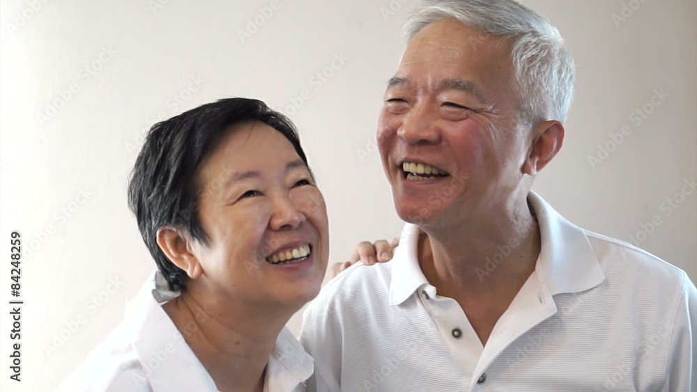 Happy Asian senior couple on white background Happy Asian senior couple on white background