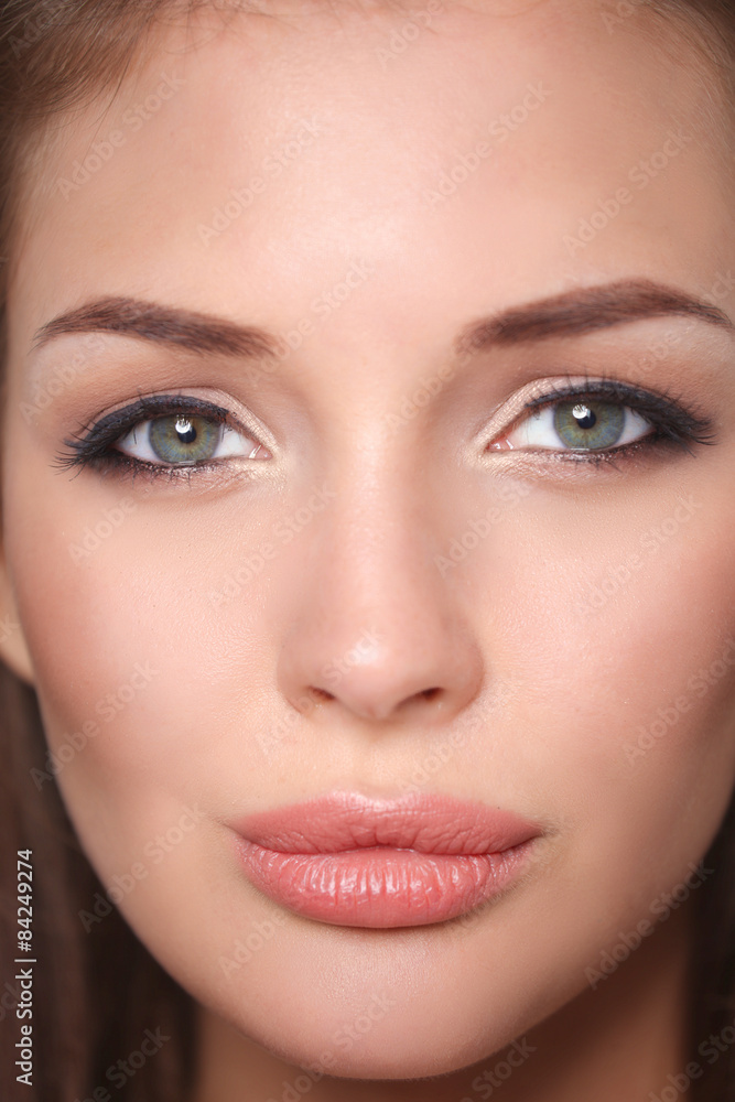 Close up portrait of beautiful young woman face. Isolated on Close up portrait of beautiful young woman face. Isolated on