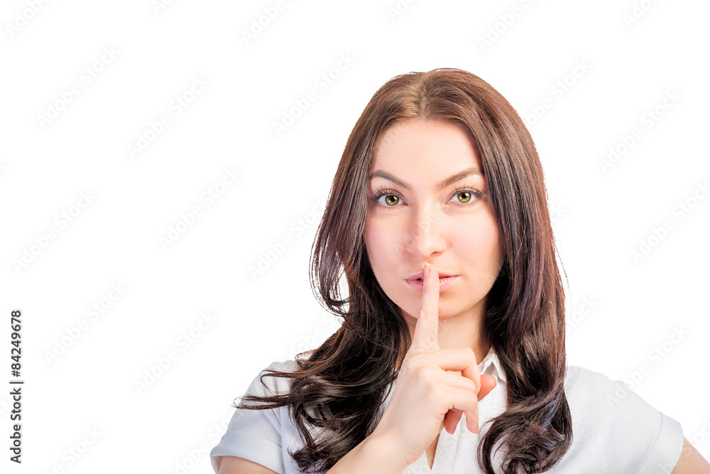 closeup portrait of a girl with finger on lips closeup portrait of a girl with finger on lips
