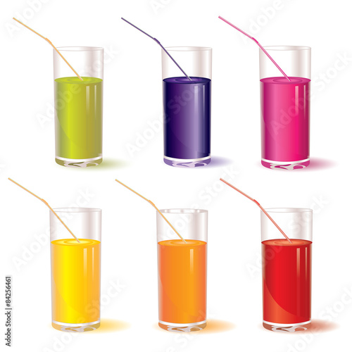 set of glasses with juice and straw