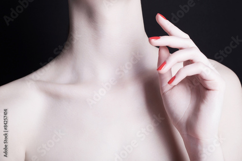 hand of woman with red manicure