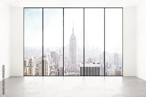 empty white room with city view