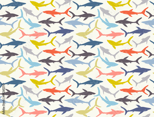 Seamless pattern of hand-drawn sharks silhouettes